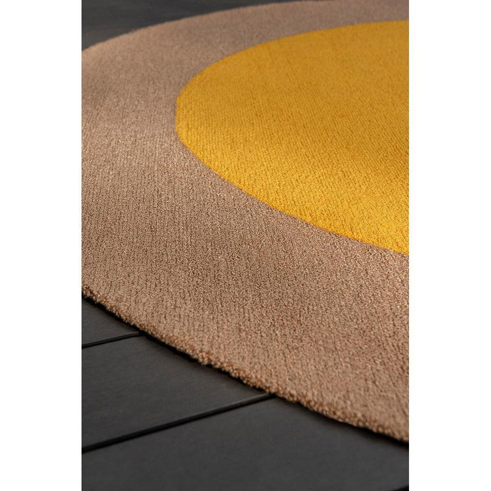 Brink & Campman Habitat Festival Round Yellow outdoor rug featuring circular mustard yellow & sandy beige on taupe background, outdoor polypropylene