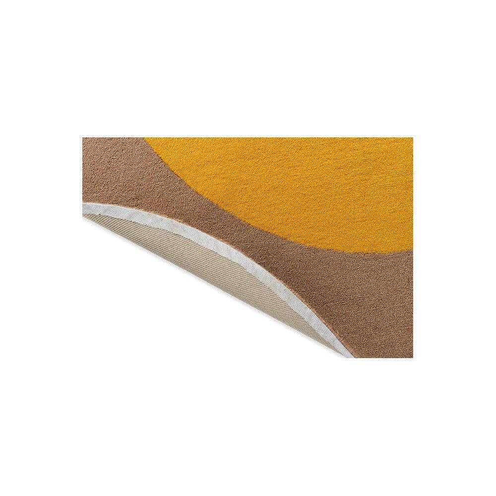 Brink & Campman Habitat Festival Round Outdoor Rug featuring curved geometric pattern in ochre yellow, cocoa brown and beige on white, machine-made polypropylene