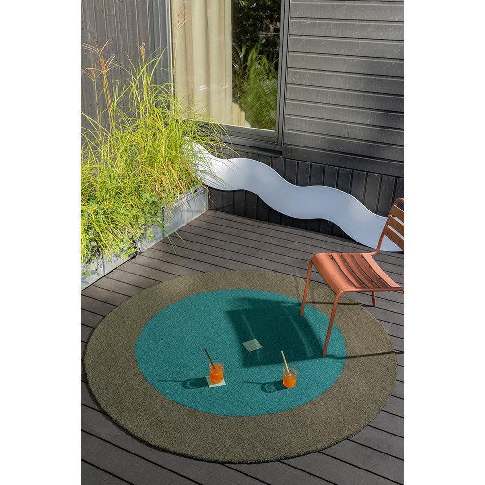 Brink & Campman Habitat Festival Round Aqua outdoor rug featuring color-block circle in teal, turquoise and sand on beige, hand-tufted wool