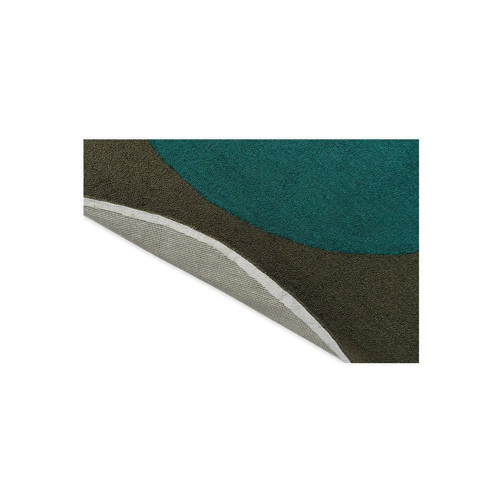 Brink & Campman Habitat Festival Round Aqua Rug featuring curved aqua teal and brown blocks on beige background, power-loomed polypropylene