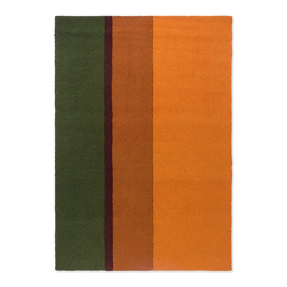 Brink & Campman Habitat Festival Stripe Orange outdoor rug featuring forest green, olive, brown and orange stripes on white background, indoor/outdoor construction