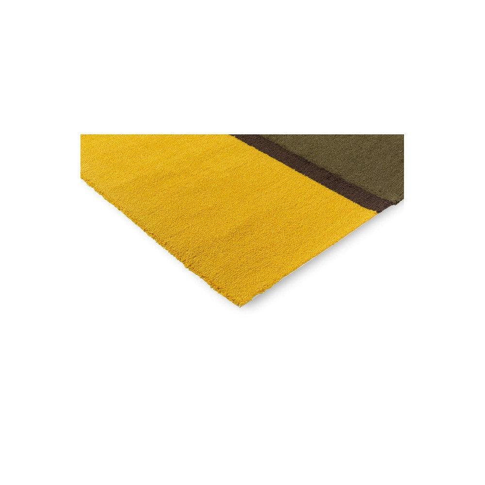 Brink & Campman Habitat Festival Stripe Yellow outdoor rug featuring mustard yellow and olive stripes on dark base, polypropylene