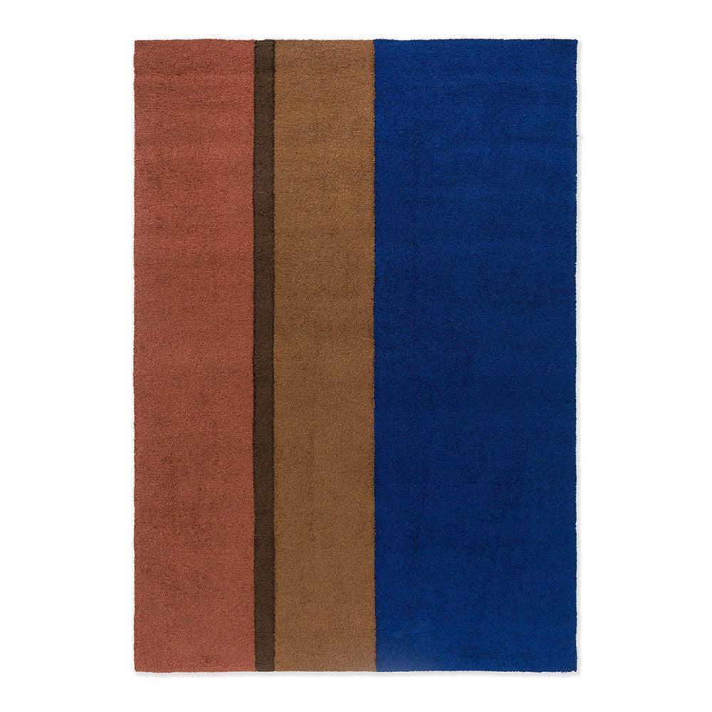 Brink & Campman Habitat Festival Stripe Blue outdoor rug featuring vertical blocks in terracotta, brown and royal blue on white background, machine-woven polypropylene