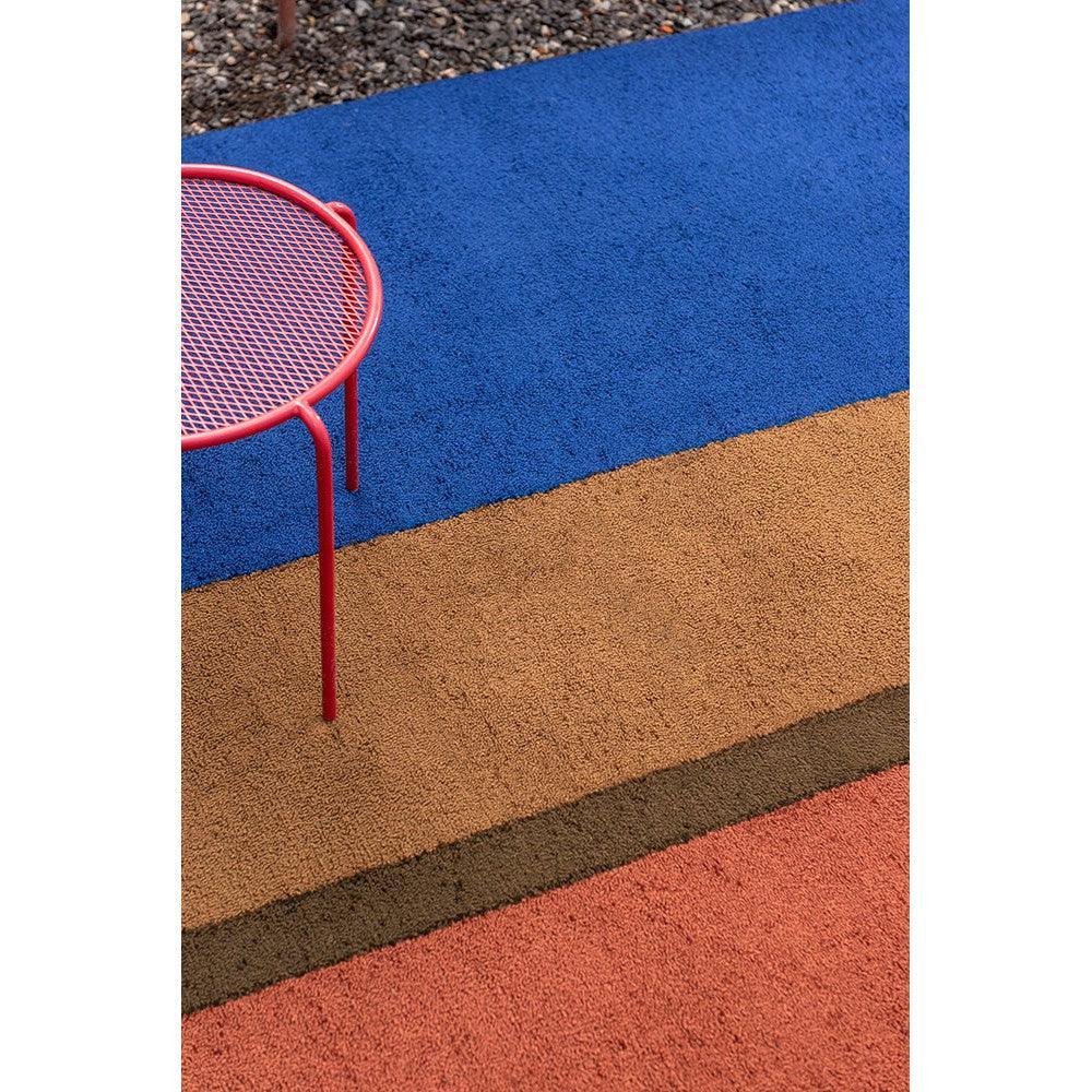 Brink & Campman Habitat Festival Stripe Blue Outdoor Rug featuring stripe pattern in blue, tan and terracotta on multicolour blocks, outdoor rug polypropylene