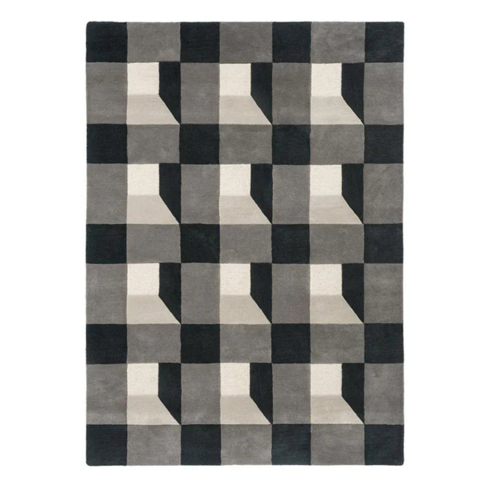 Harlequin Blocks Slate Designer Rug featuring geometric block pattern in slate, charcoal, taupe and cream on pale background, hand-tufted wool