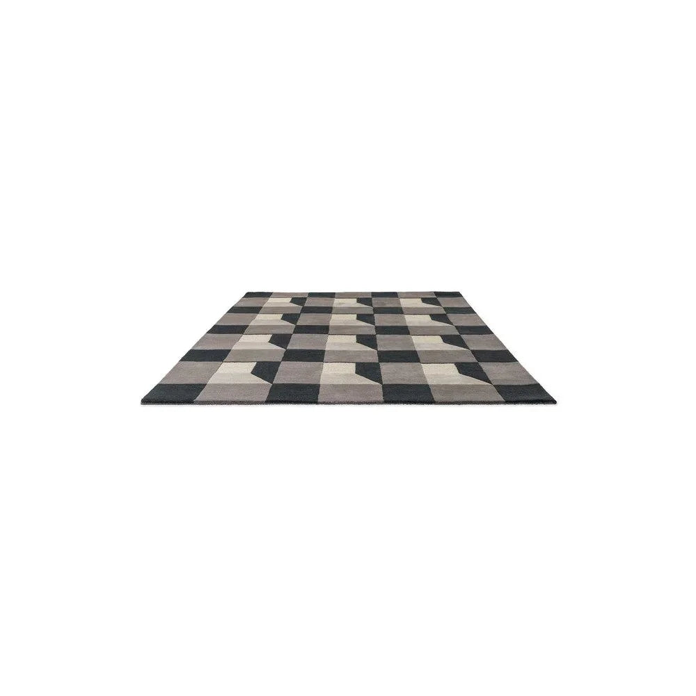 Harlequin Blocks Slate Designer Rug featuring a checkerboard geometric pattern in slate, charcoal and beige on ivory background
