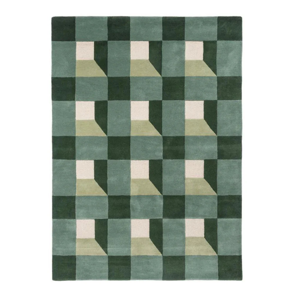 Harlequin Blocks Fern Designer Rug featuring geometric checkerboard in emerald, sage green, forest with pale pink squares on moss-green background, hand-tufted wool