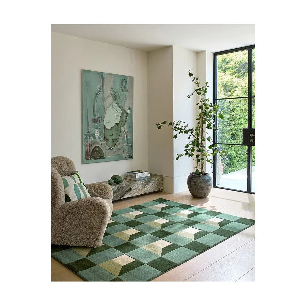Harlequin Blocks Fern Designer Rug featuring geometric block pattern in emerald, sage green, teal and ivory on cream background, hand-tufted wool