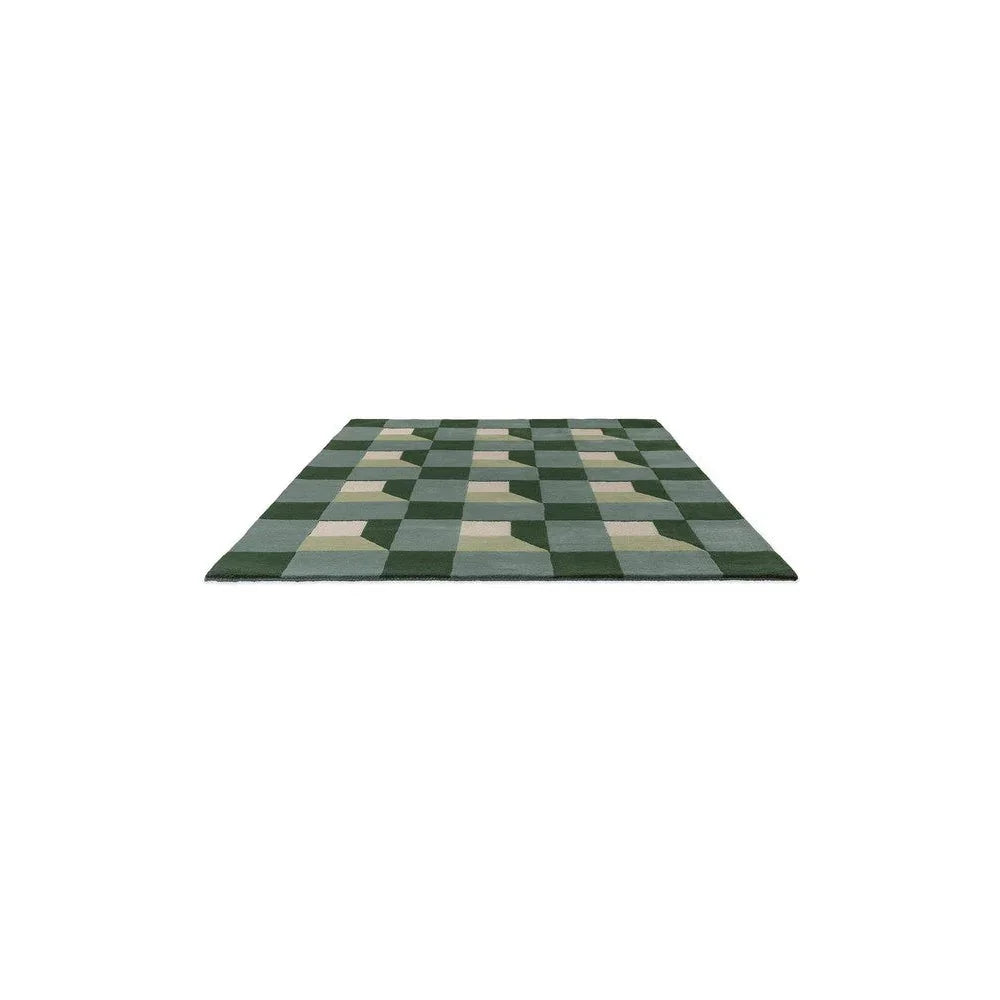Harlequin Blocks Fern Designer Rug featuring checkerboard geometric pattern in forest green, sage, olive and beige on cream background, machine-made rug