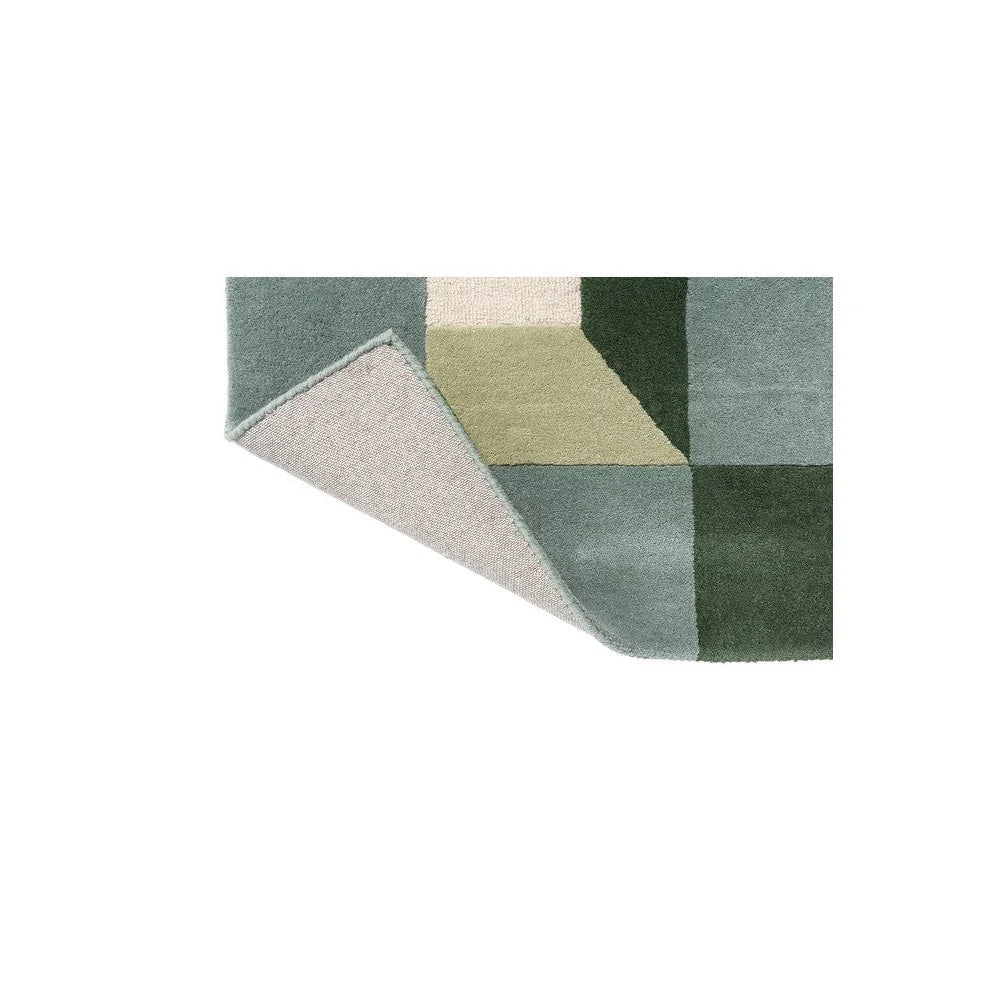 Harlequin Blocks Fern Designer Rug featuring patchwork blocks in teal, sage, olive green, beige on cream background, hand-tufted wool