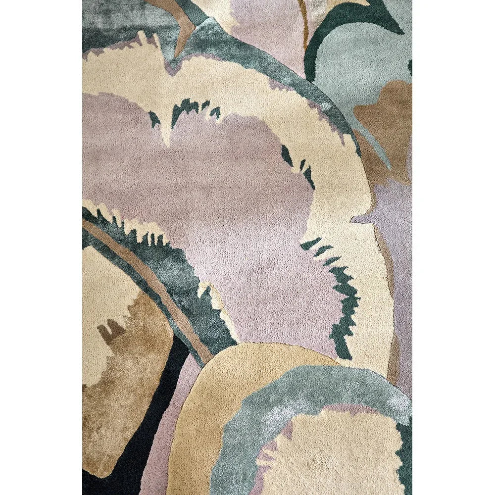 Harlequin Calathea rug featuring botanical pattern in dusty pink, sage green, beige, teal on cream, hand-tufted wool