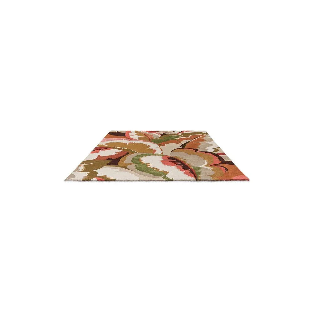 Harlequin Calathea Amber/Brazilian Rosewood rug featuring botanical leaf pattern in coral, sage-green, beige on ivory background, hand-tufted wool