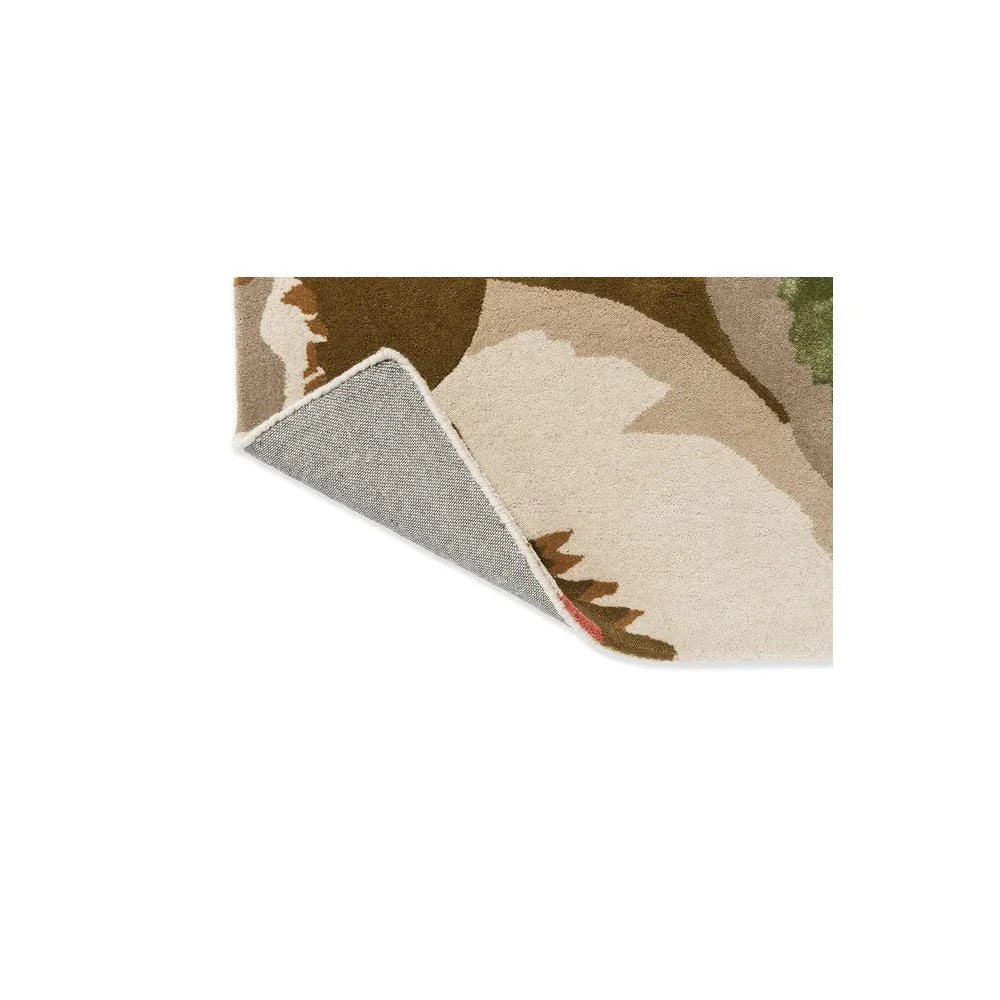 Harlequin Calathea Amber / Brazilian Rosewood Designer Rug featuring abstract camo pattern in beige, taupe, brown, olive on cream background, machine-woven polyester