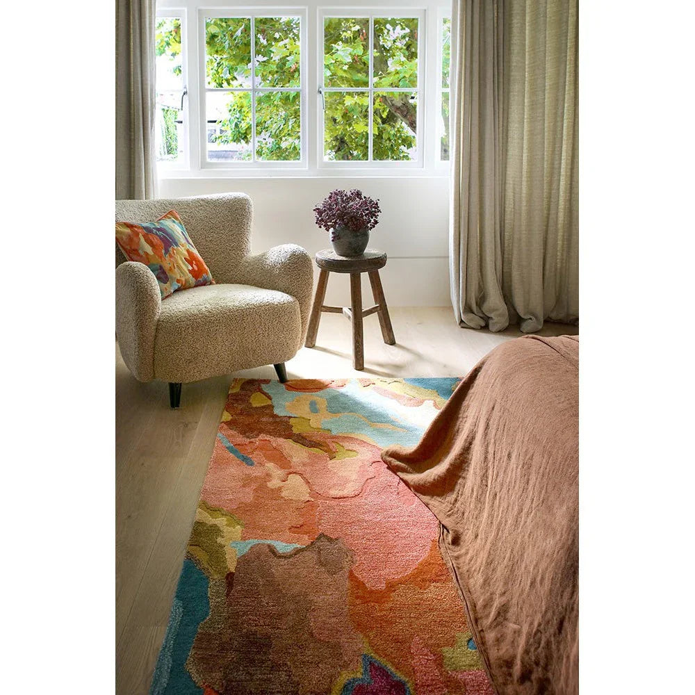 Harlequin Foresta rug featuring abstract organic pattern in rosewood, huckleberry, coral, teal on cream, hand-tufted wool