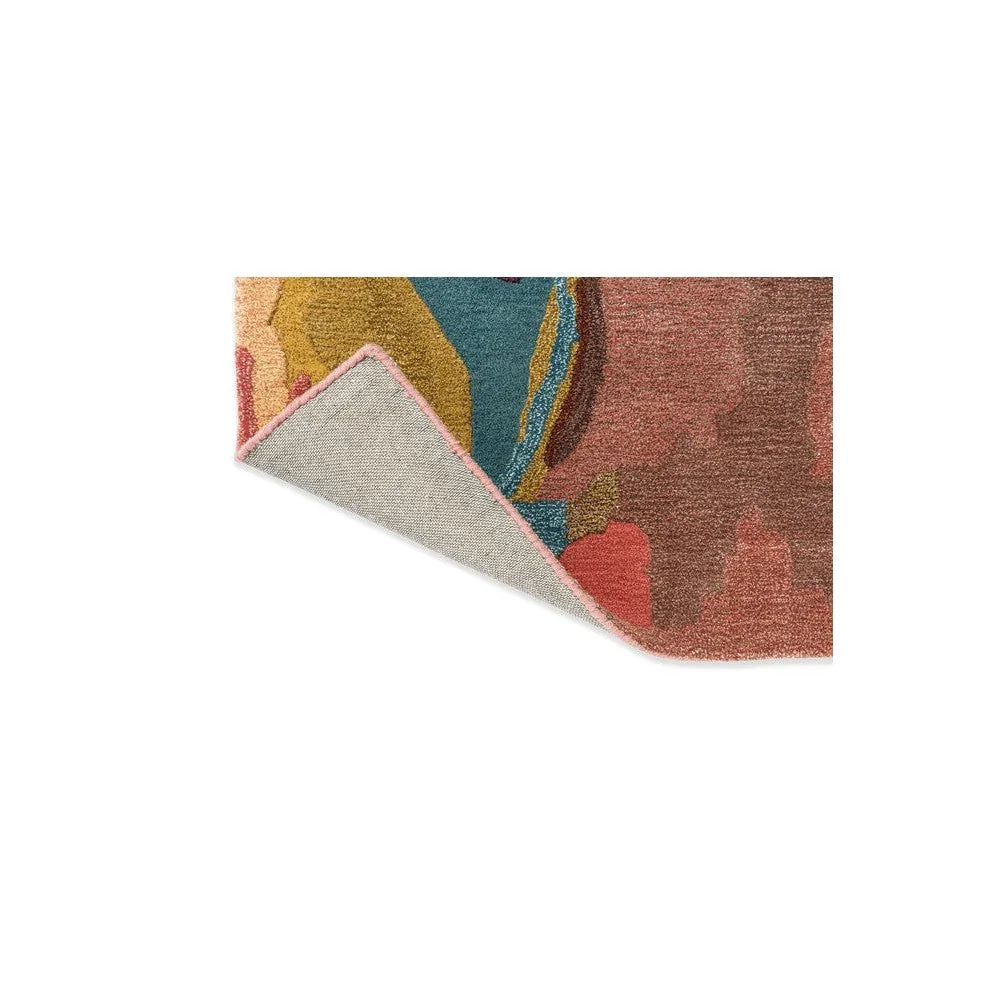 Harlequin Foresta rug featuring abstract patchwork in rosewood, huckleberry blue, teal, mustard and pink on cream background, hand-tufted wool