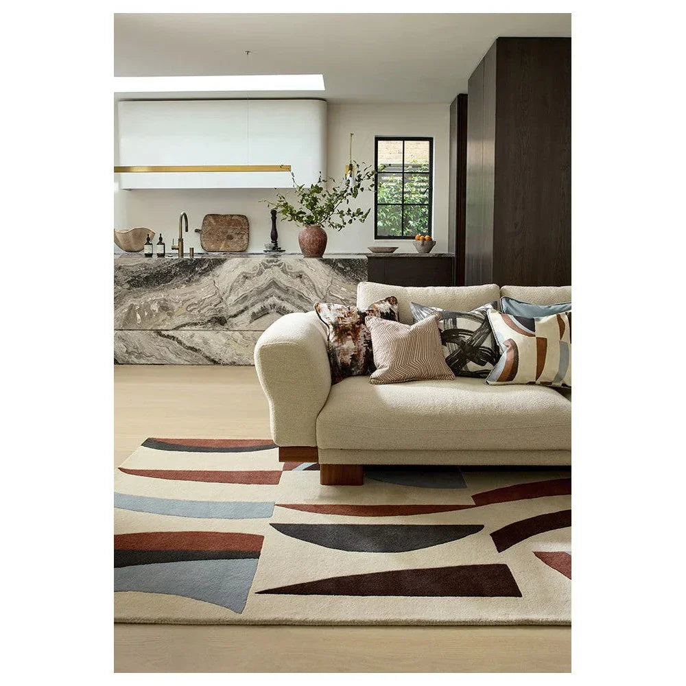Harlequin Torillo Cornflower / Walnut Designer Rug featuring abstract geometric pattern in cornflower blue, navy, rust and cream on cream, machine-woven wool blend