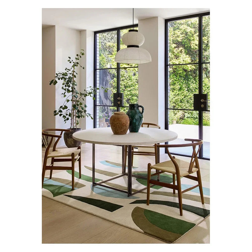 Harlequin Torillo Emerald / Azul Designer Rug featuring abstract geometric pattern in emerald, teal, sage and cream on cream background, hand-tufted wool