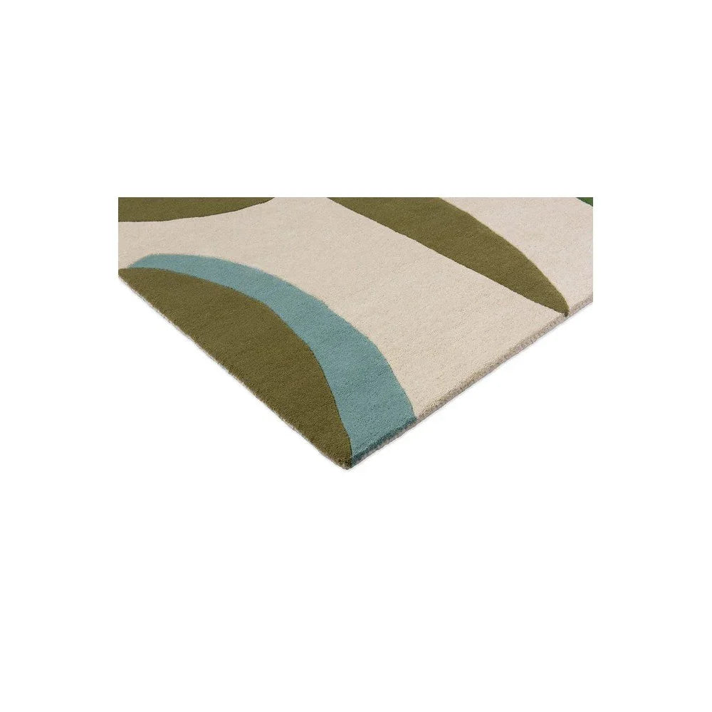 Harlequin Torillo Emerald/Azul Designer Rug with abstract curved pattern in emerald, teal and olive on cream background, hand-tufted wool