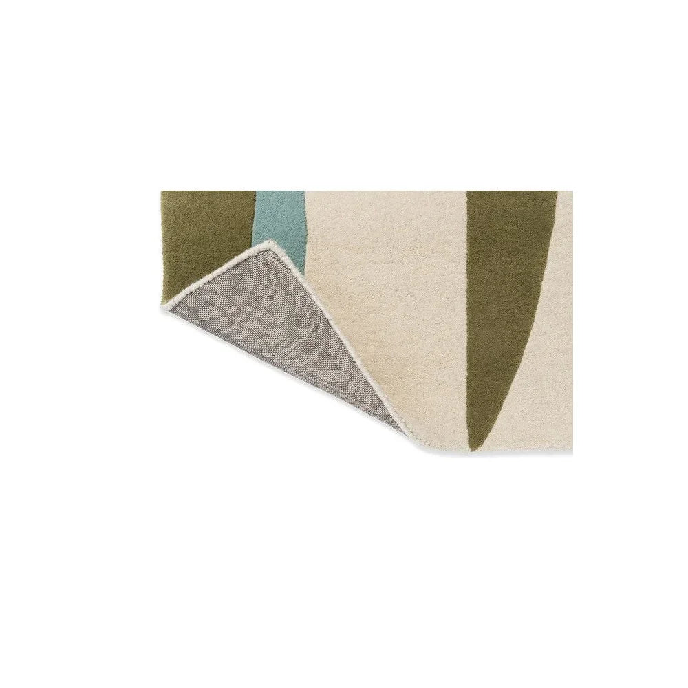 Harlequin Torillo Emerald/Azul Designer Rug featuring abstract geometric pattern in emerald, teal, beige and taupe on cream background, hand-tufted wool