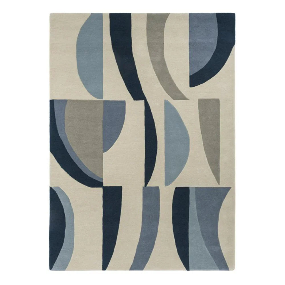 Harlequin Torillo Sky rug featuring mid-century geometric pattern in cornflower blue, navy and beige on cream background, hand-tufted wool