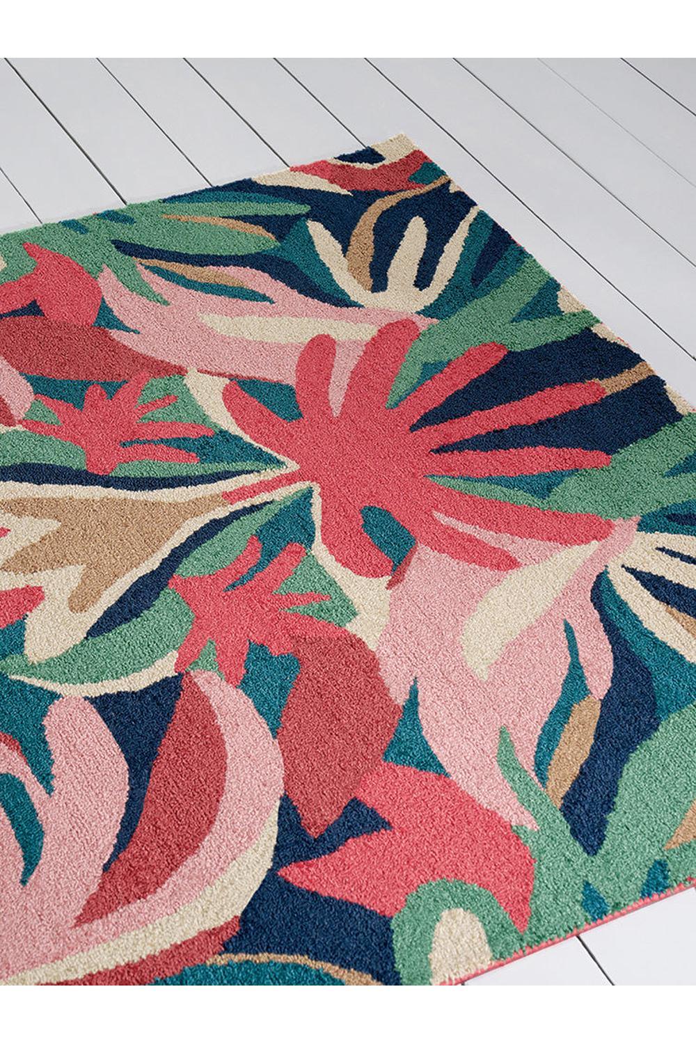 Harlequin Melora Pink Outdoor Rug featuring tropical floral pattern in pink, coral, emerald, navy on beige, machine-tufted polypropylene