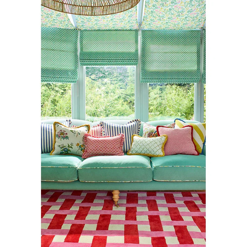 Sophie Robinson x Harlequin Basket Weave Coral/Rose Designer Rug featuring brick-like pattern in coral, rose and pink on soft pink background, hand-tufted wool
