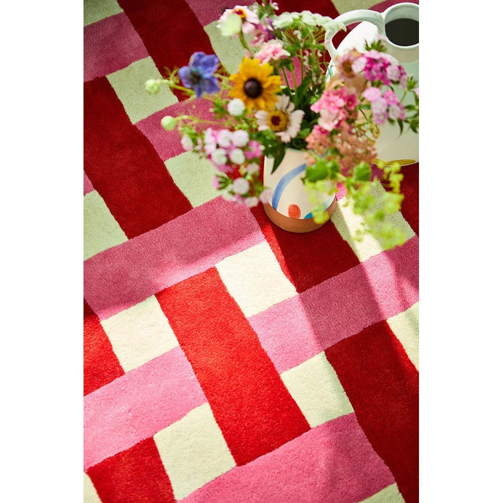 Sophie Robinson x Harlequin Basketweave rug featuring checkerboard in coral, rose and cream on cream background, hand-tufted wool