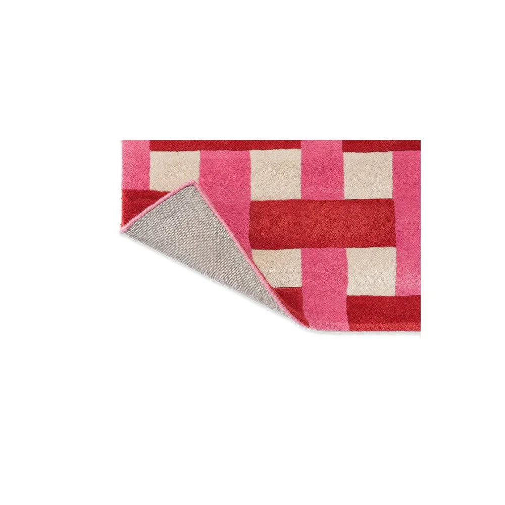 Sophie Robinson x Harlequin Basket Weave Rug featuring coral/rose pink basket weave in pinks and cream on cream background, hand-tufted wool