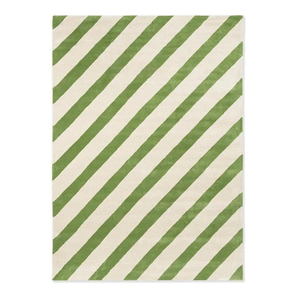 Sophie Robinson x Harlequin Paper Straw Peridot Designer Rug featuring diagonal stripe pattern in peridot green and cream on ivory background, hand-tufted wool