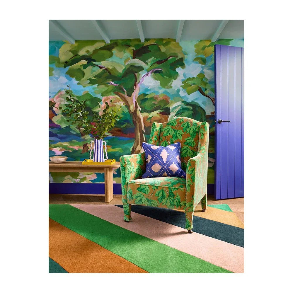 Sophie Robinson x Harlequin Sherbet Stripe Emerald/Amber Designer Rug featuring bold stripe pattern in emerald, lime, orange, pink on pale background, hand-tufted wool