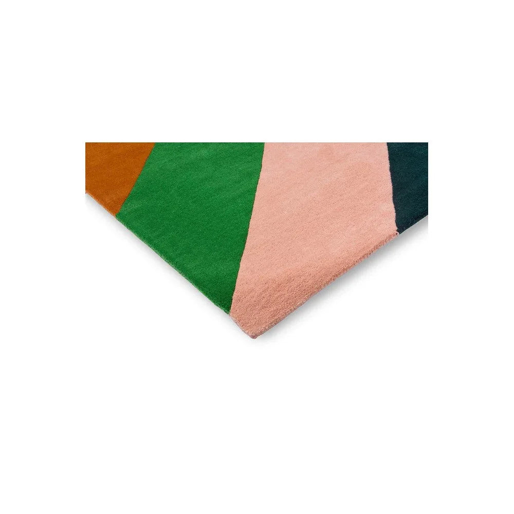 Sophie Robinson x Harlequin Sherbet Stripe rug featuring color-block stripes in emerald green, amber, peach pink and navy on white, hand-tufted wool