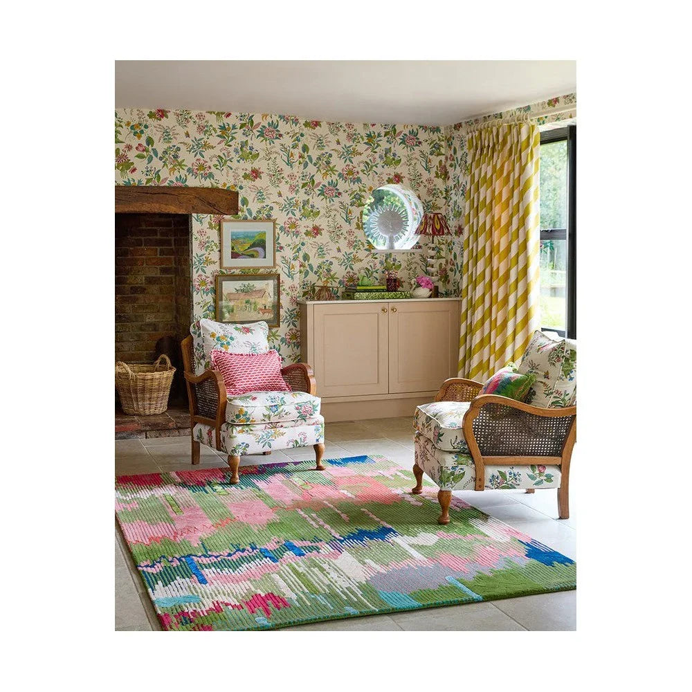 Sophie Robinson x Harlequin Wilderness rug featuring abstract patchwork pattern in peridot, emerald, pink, blue on cream background, hand-tufted wool