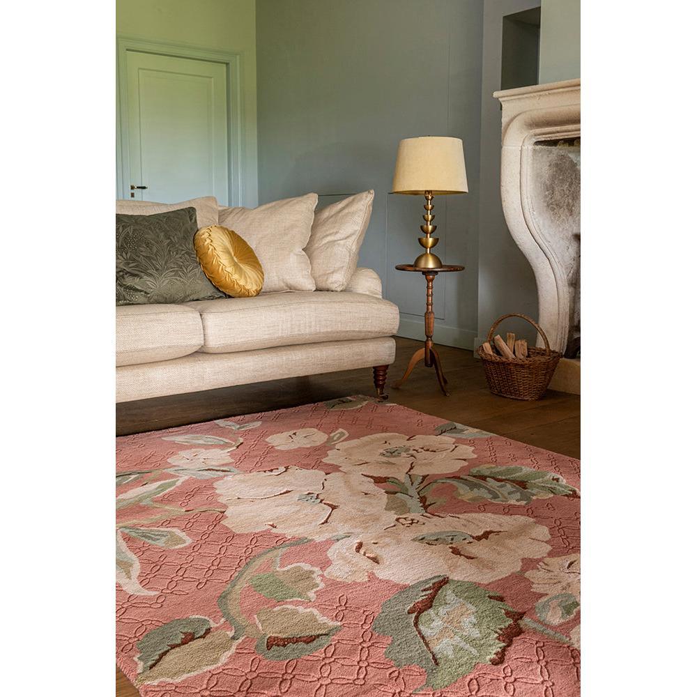 Laura Ashley Aylworth Trail Terracotta Designer Rug featuring floral motif in terracotta pink, cream and sage-green on pink background, hand-tufted wool