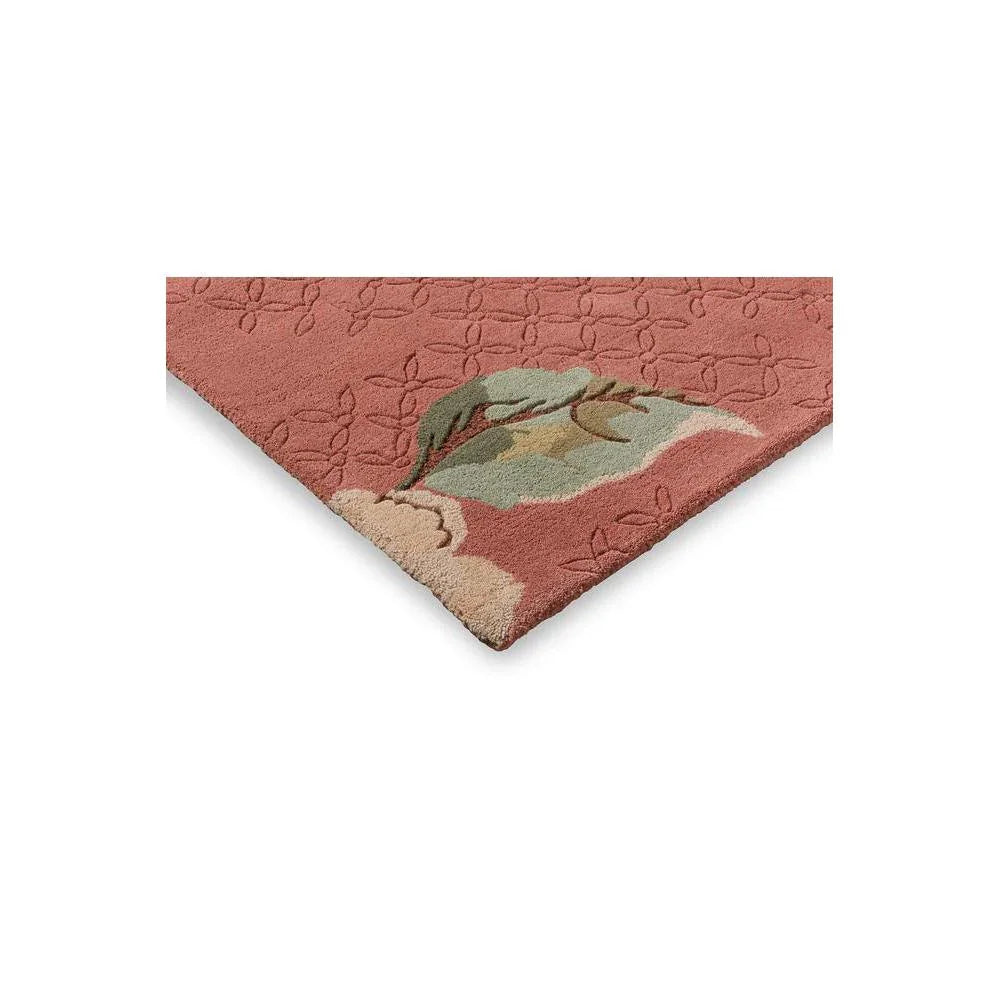 Laura Ashley Aylworth Trail Terracotta Rug featuring floral pattern in terracotta orange, sage green and cream on terracotta, hand-tufted wool