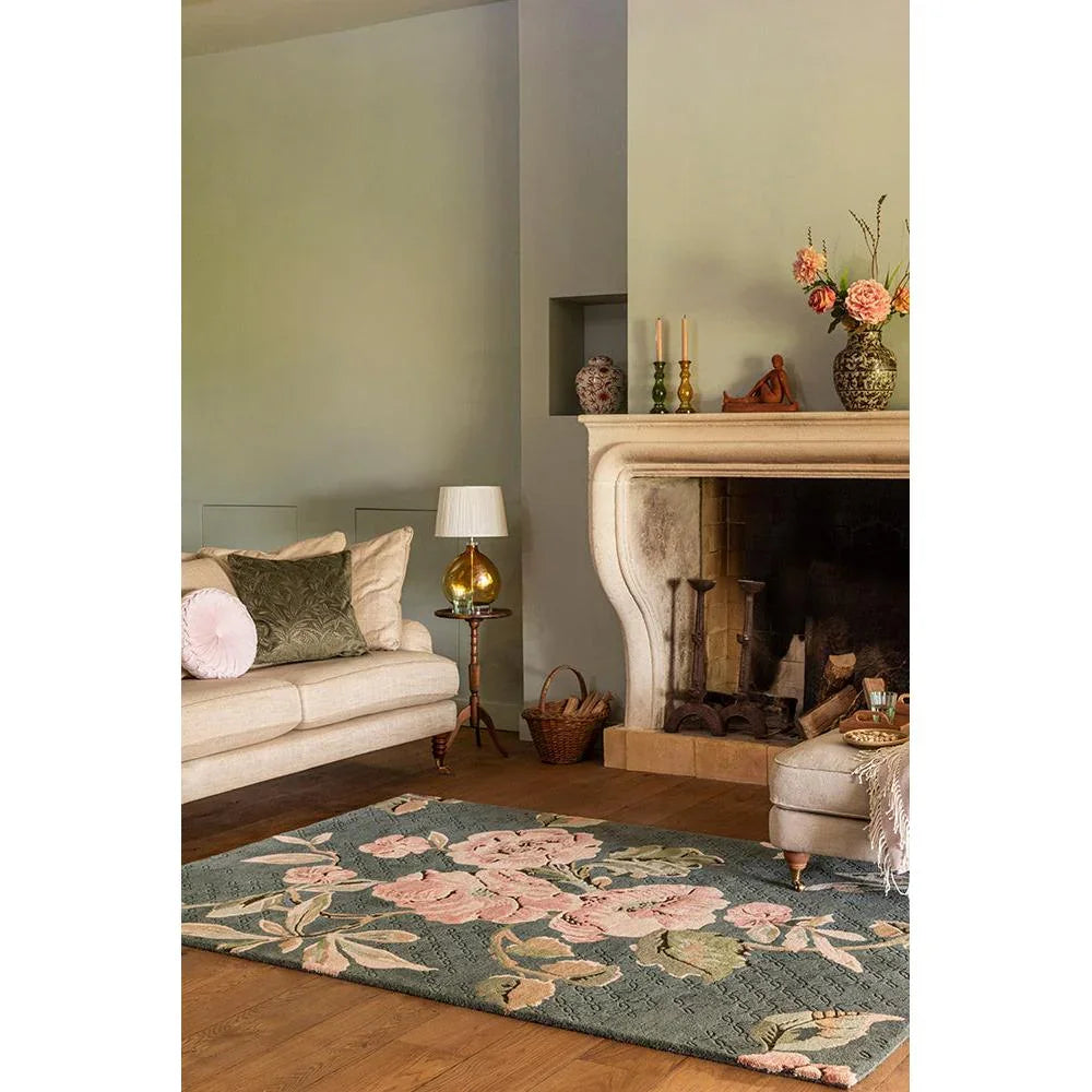 Laura Ashley Aylworth Trail Fern Green Designer Rug featuring floral pattern in pink, rose and sage green on teal background, hand-tufted wool