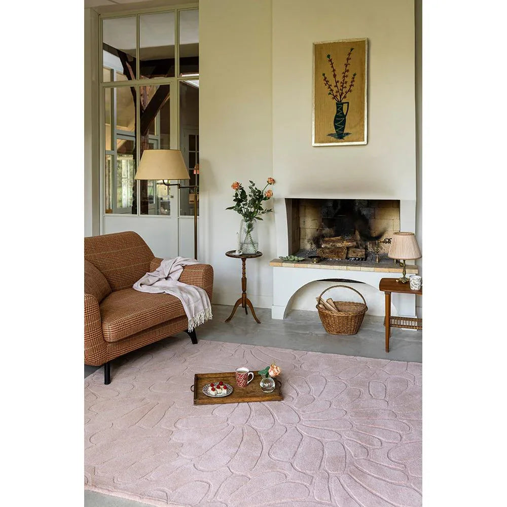 Laura Ashley Coleby Petals Chalk Pink Rug featuring petal motif in chalk pink, blush and cream on pale pink background, hand-tufted wool