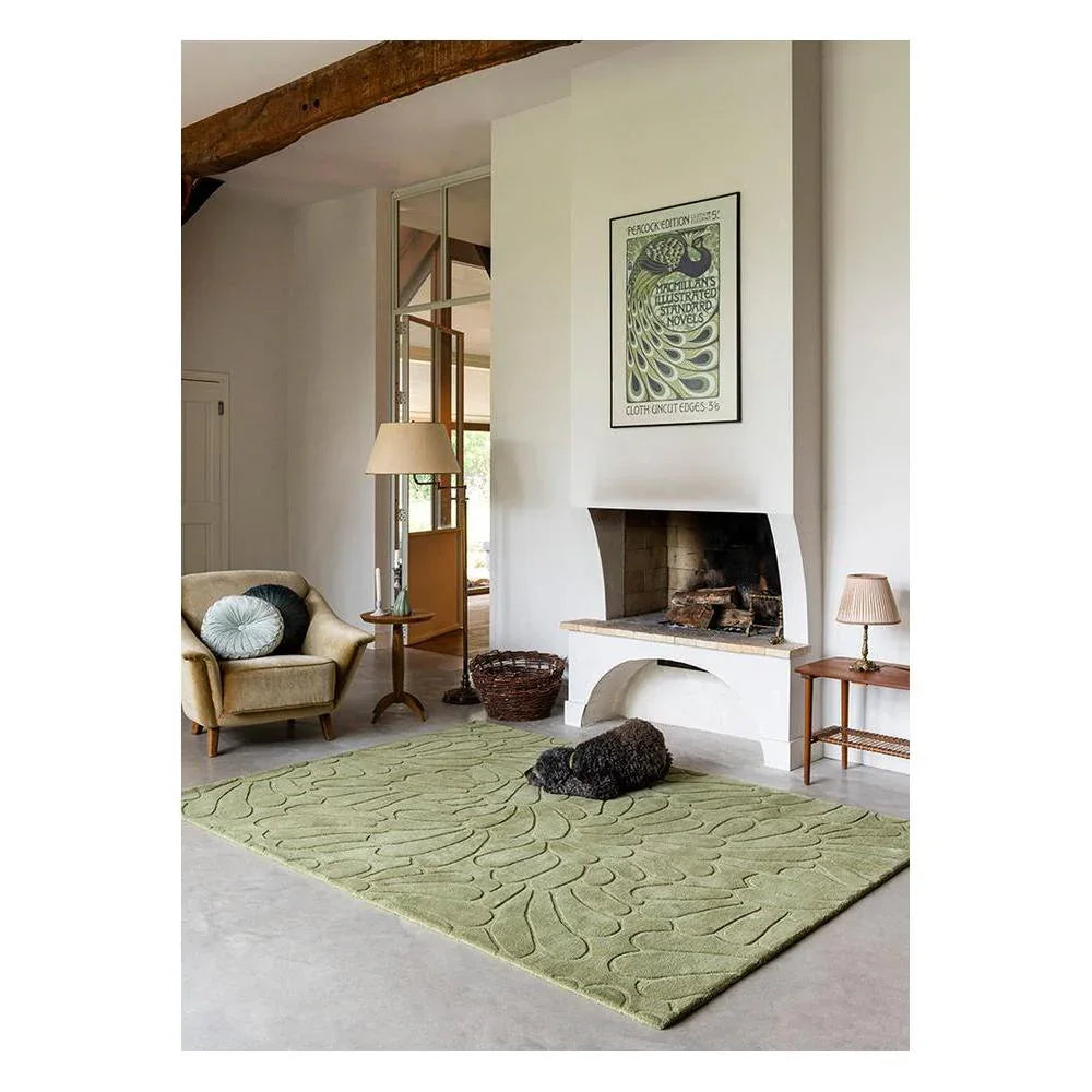 Laura Ashley Coleby Petals Hedgerow Green Designer Rug featuring petal pattern in hedgerow green, olive on pale sage background, hand-tufted wool