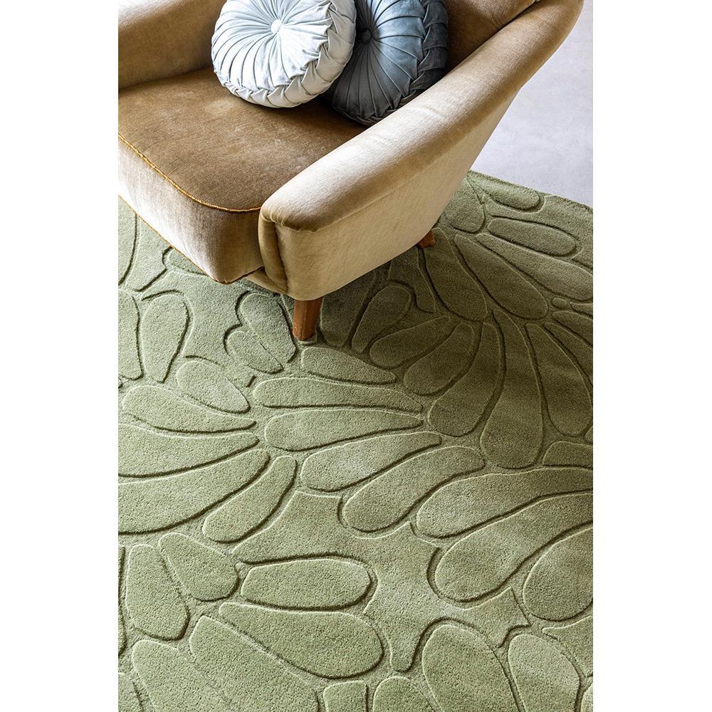 Laura Ashley Coleby Petals Hedgerow Green Designer Rug featuring petal pattern in hedgerow green on light sage background, hand-tufted wool