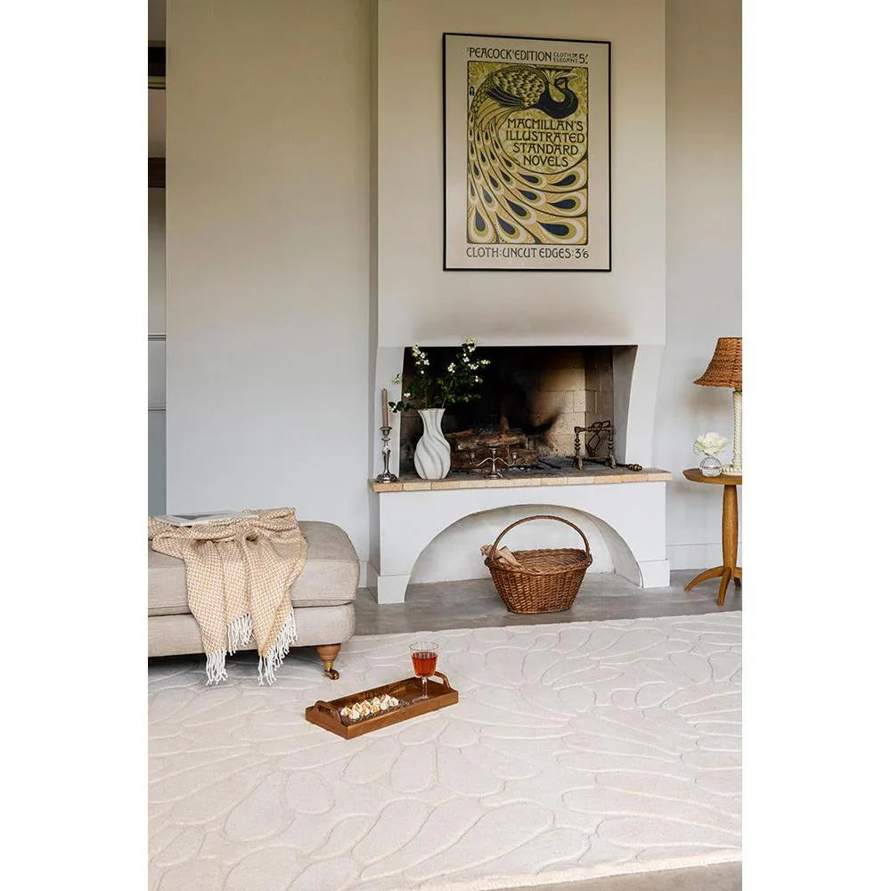 Laura Ashley Coleby Petals Ivory Cream Designer Rug featuring petal floral pattern in ivory, cream and beige on ivory background, hand-tufted wool