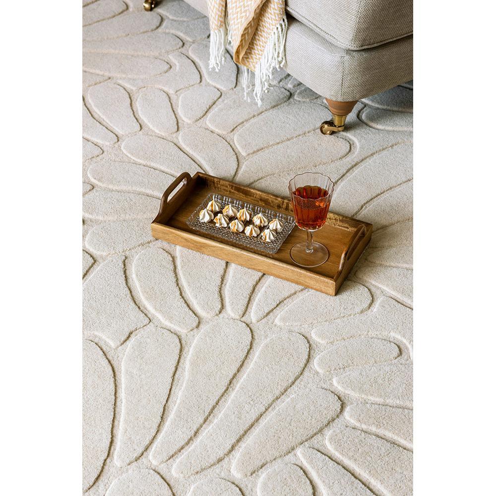 Laura Ashley Coleby Petals Ivory Cream Designer Rug featuring petal pattern in ivory, cream on pale background, hand-tufted wool