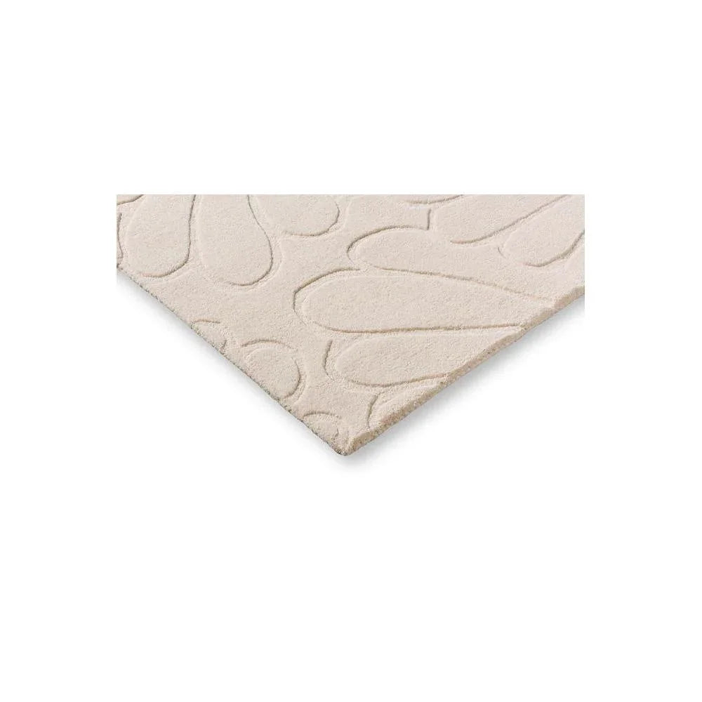 Laura Ashley Coleby Petals Ivory Cream Rug featuring embossed petal pattern in ivory/cream on ivory background, machine-woven wool