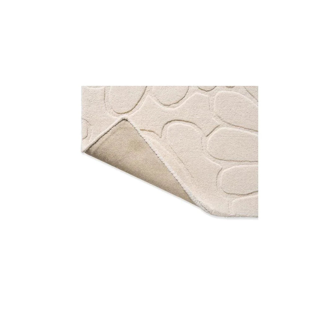 Laura Ashley Coleby Petals Ivory Cream Rug featuring petal pattern in ivory, cream and beige on ivory ground, machine-made polyester