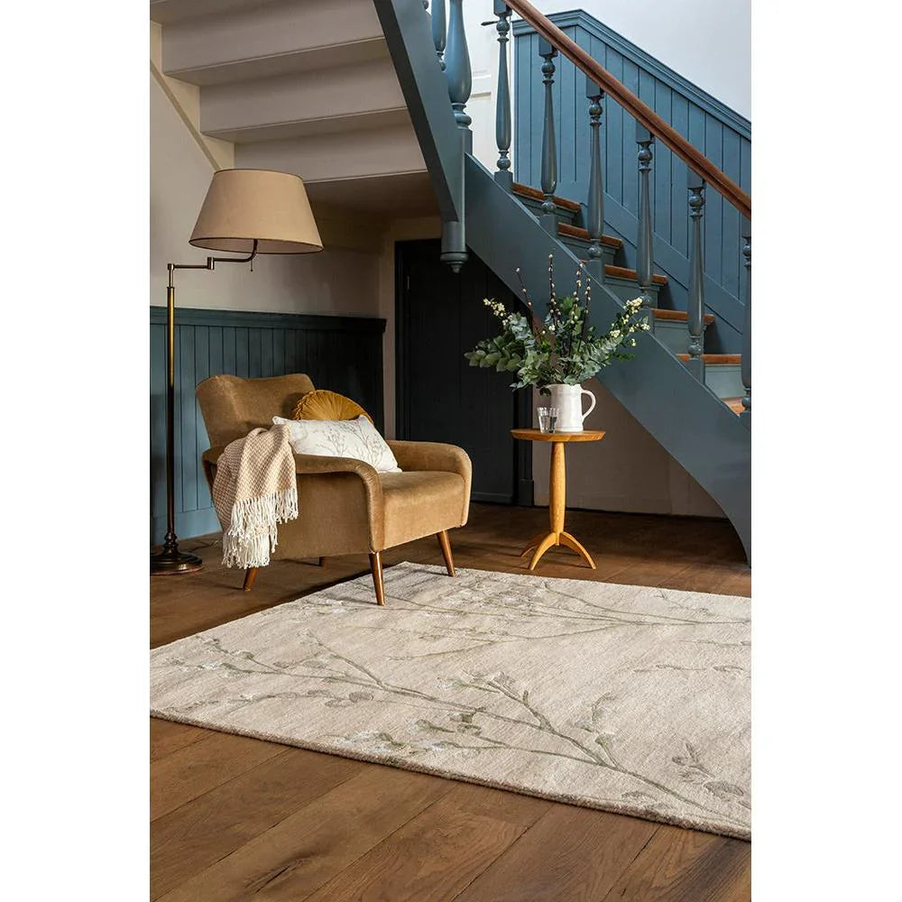 Laura Ashley Pussy Willow Hedgerow Green Rug featuring botanical pattern in sage, olive and cream on ivory, hand-tufted wool
