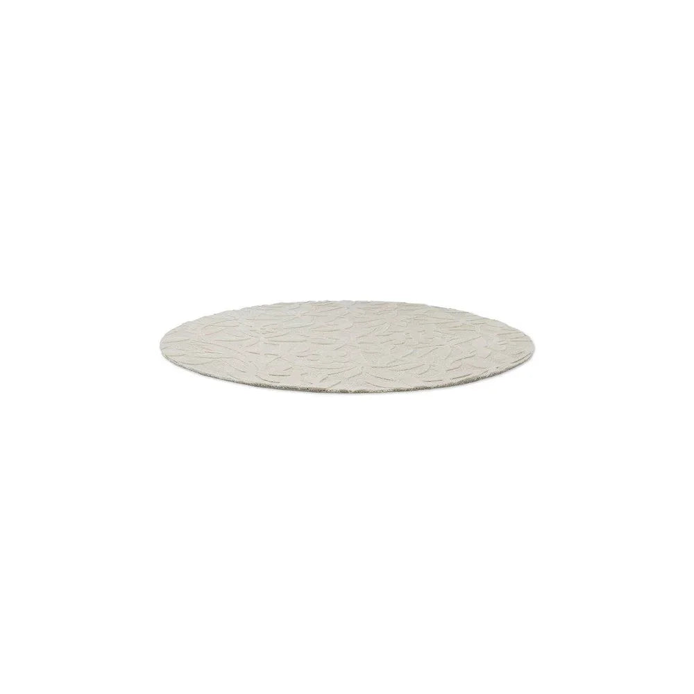 Laura Ashley Cleavers Natural round rug featuring subtle textured pattern in cream and beige on natural background, hand-tufted wool