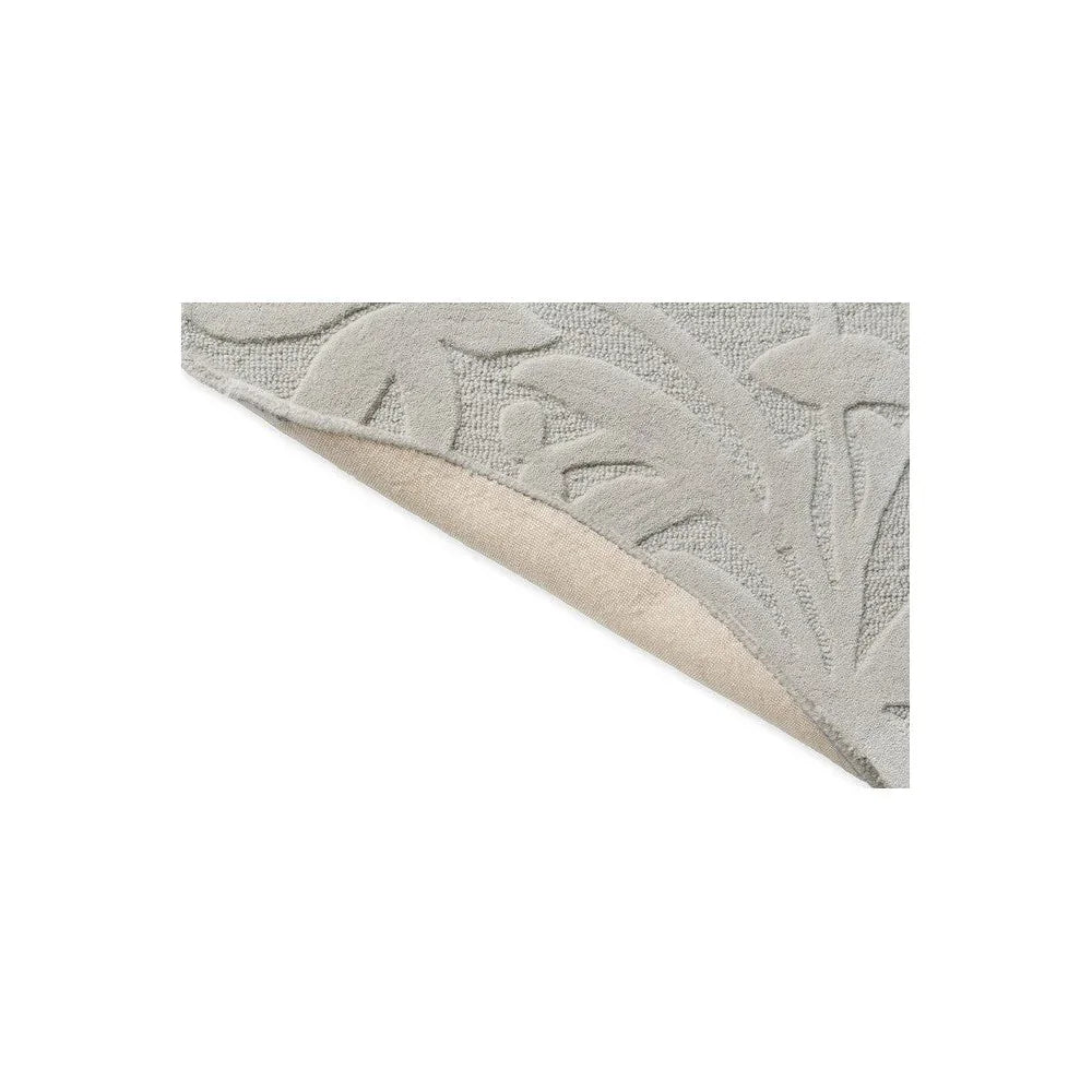 Laura Ashley Cleavers Natural Designer Round Rug featuring embossed botanical leaf pattern in ivory and light beige on cream background