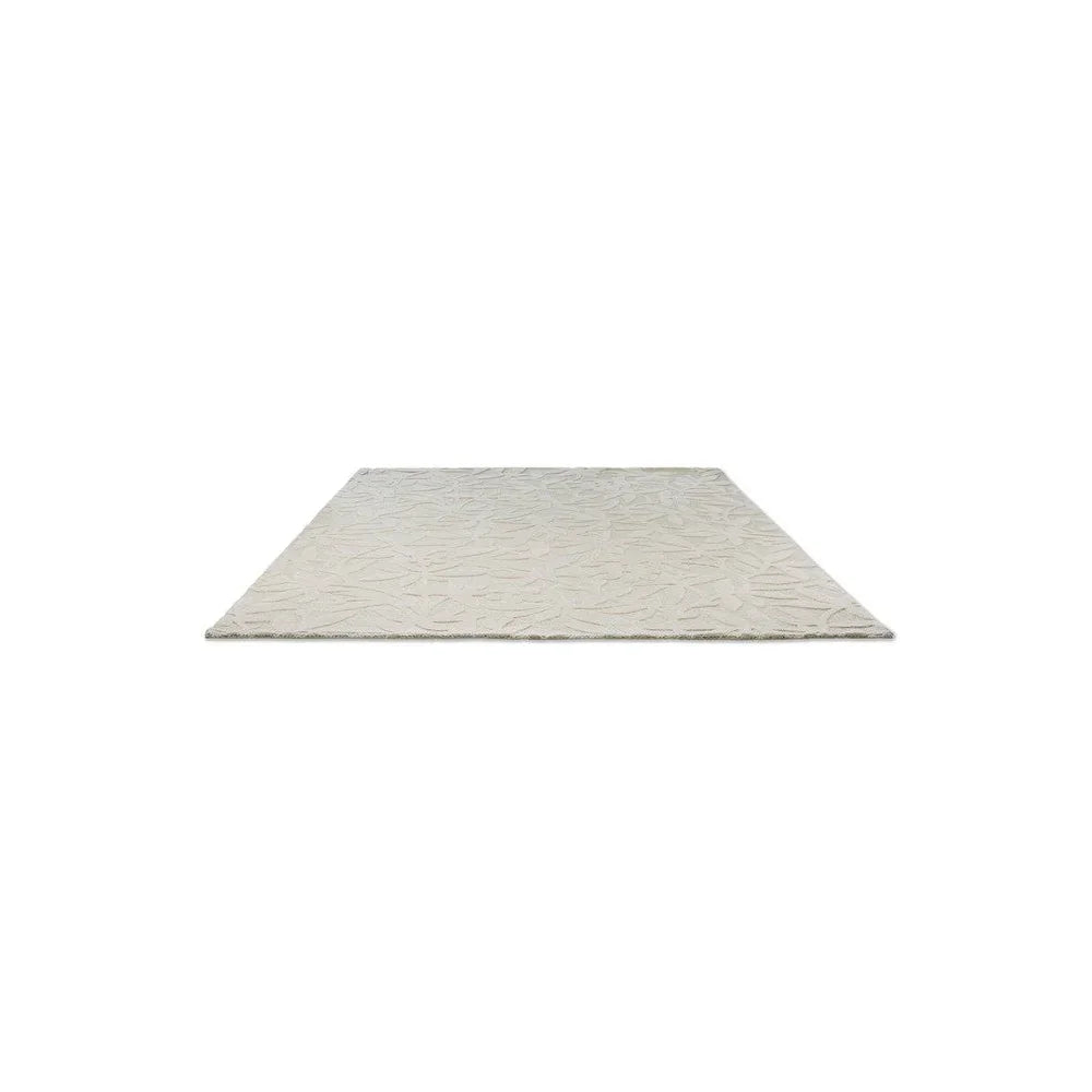 Laura Ashley Cleavers Natural Designer Rug featuring botanical textured pattern in ivory, cream and beige on cream background, hand-tufted wool