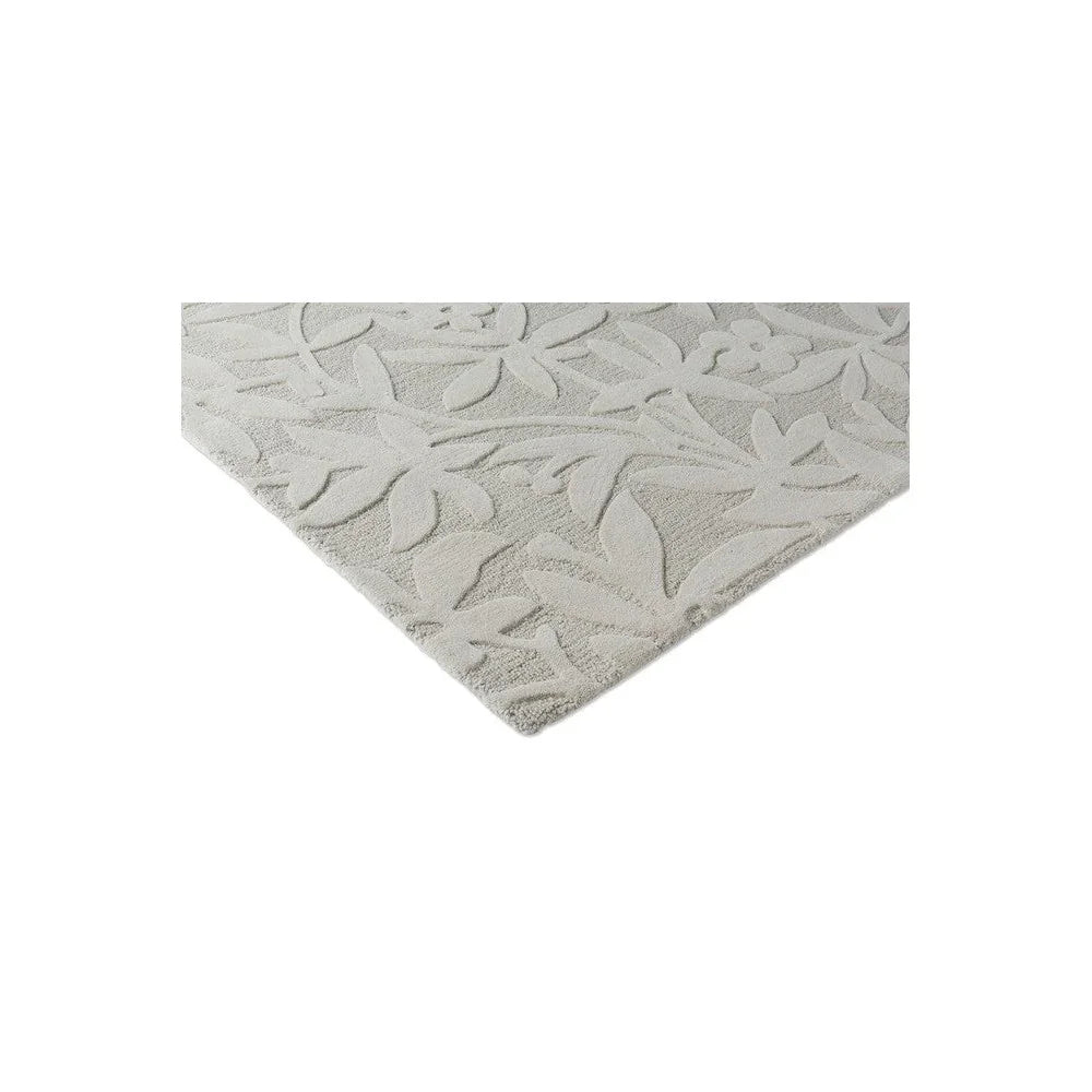 Laura Ashley Cleavers Natural Designer Rug featuring botanical leaf pattern in ivory, cream and light grey on cream background, hand-tufted wool