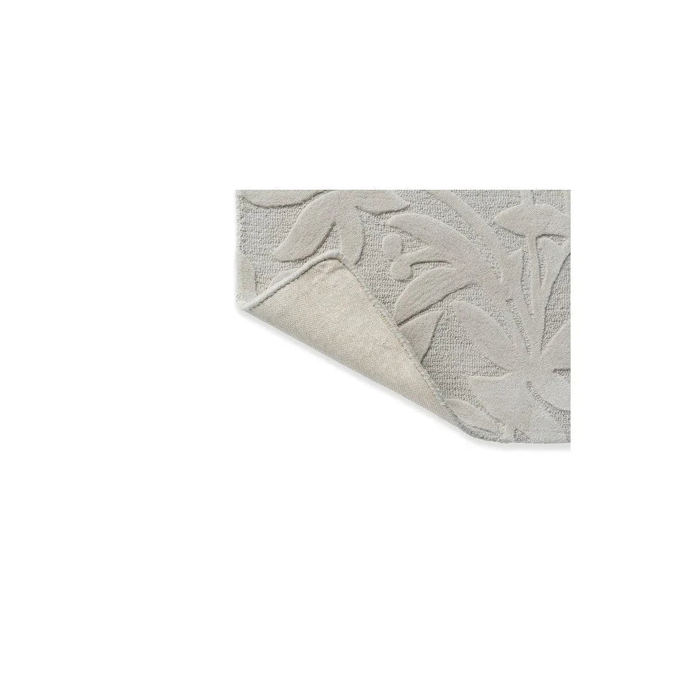 Laura Ashley Cleavers Natural Designer Rug featuring botanical leaf pattern in light grey on ivory background, machine-woven polyester