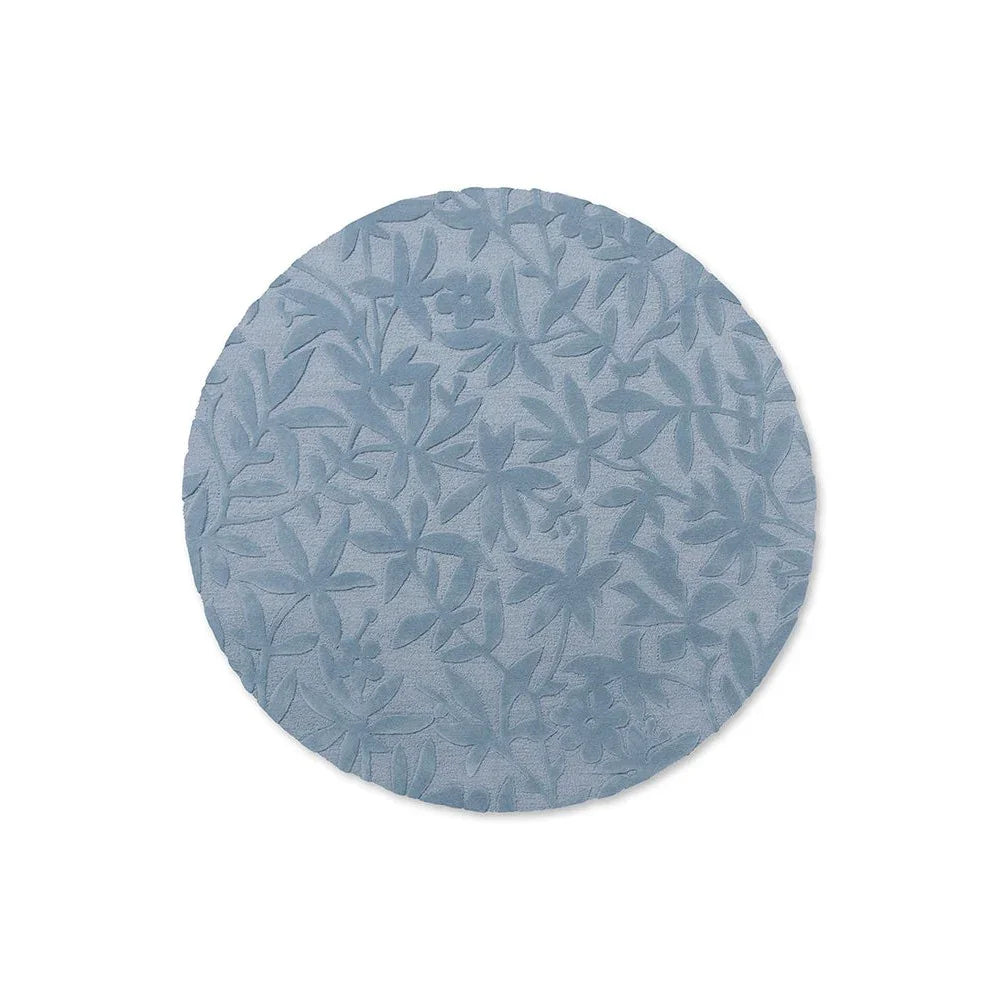 Laura Ashley Cleavers Seaspray Designer Rug featuring botanical floral pattern in pale blue and steel blue on white background, hand-tufted wool