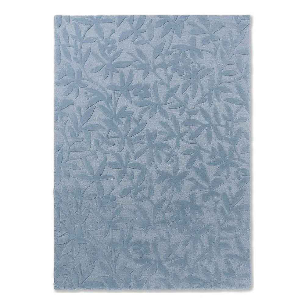 Laura Ashley Cleavers Seaspray rug featuring embossed floral vine pattern in seaspray blue on pale blue, hand-tufted wool